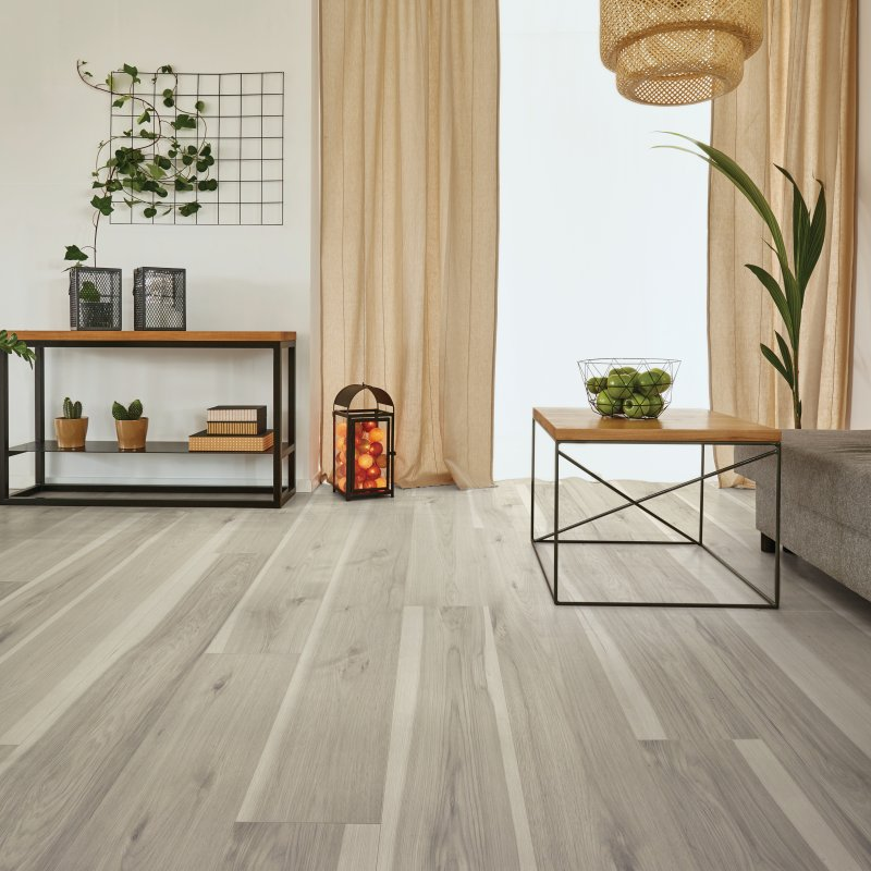 Living room with laminate flooring - Harbor Grand - Mist Hickory
